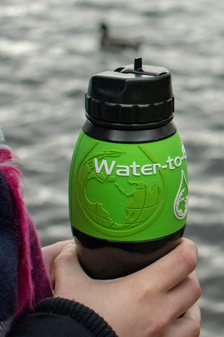 Would Be Traveller Water-to-go review bottle in hand