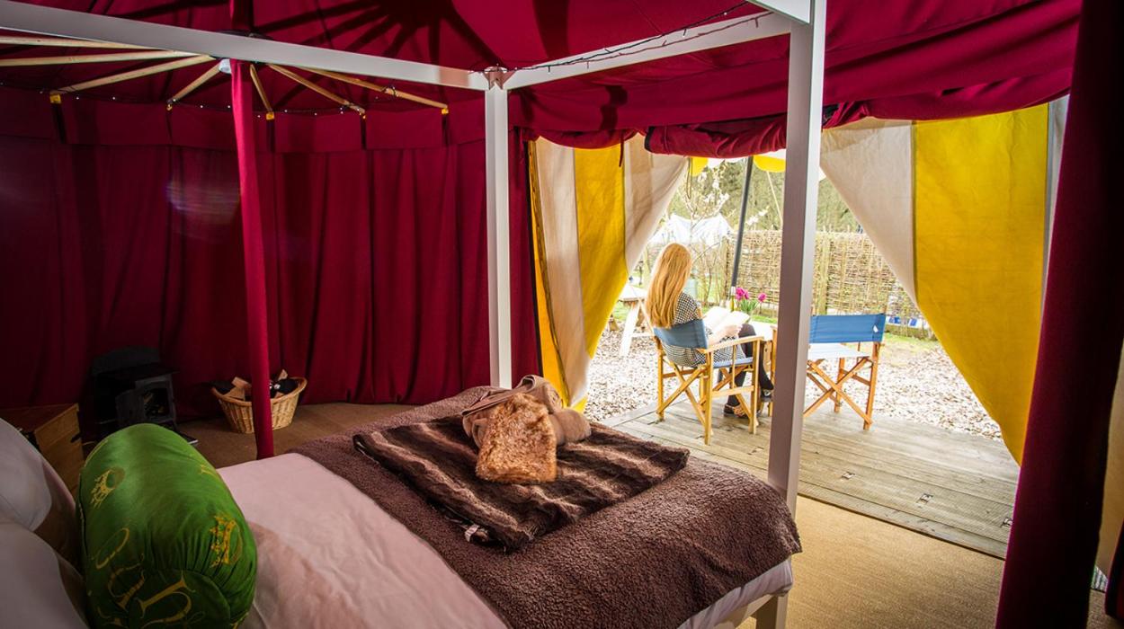 Inside a tent at Leeds Castle Knight Glamping