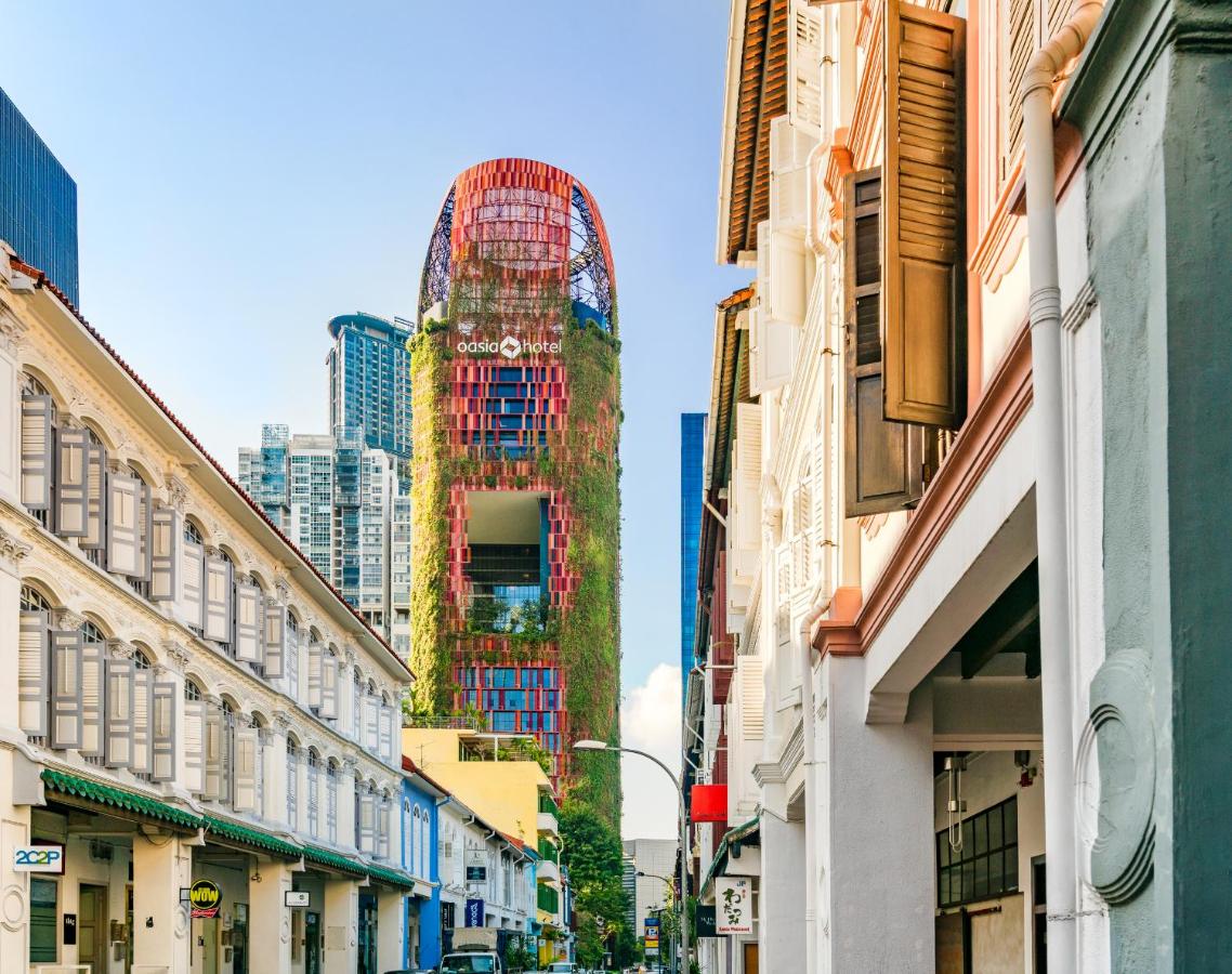 Exterior shot of Oasia Hotel in Singapore with Chinatown in the foreground