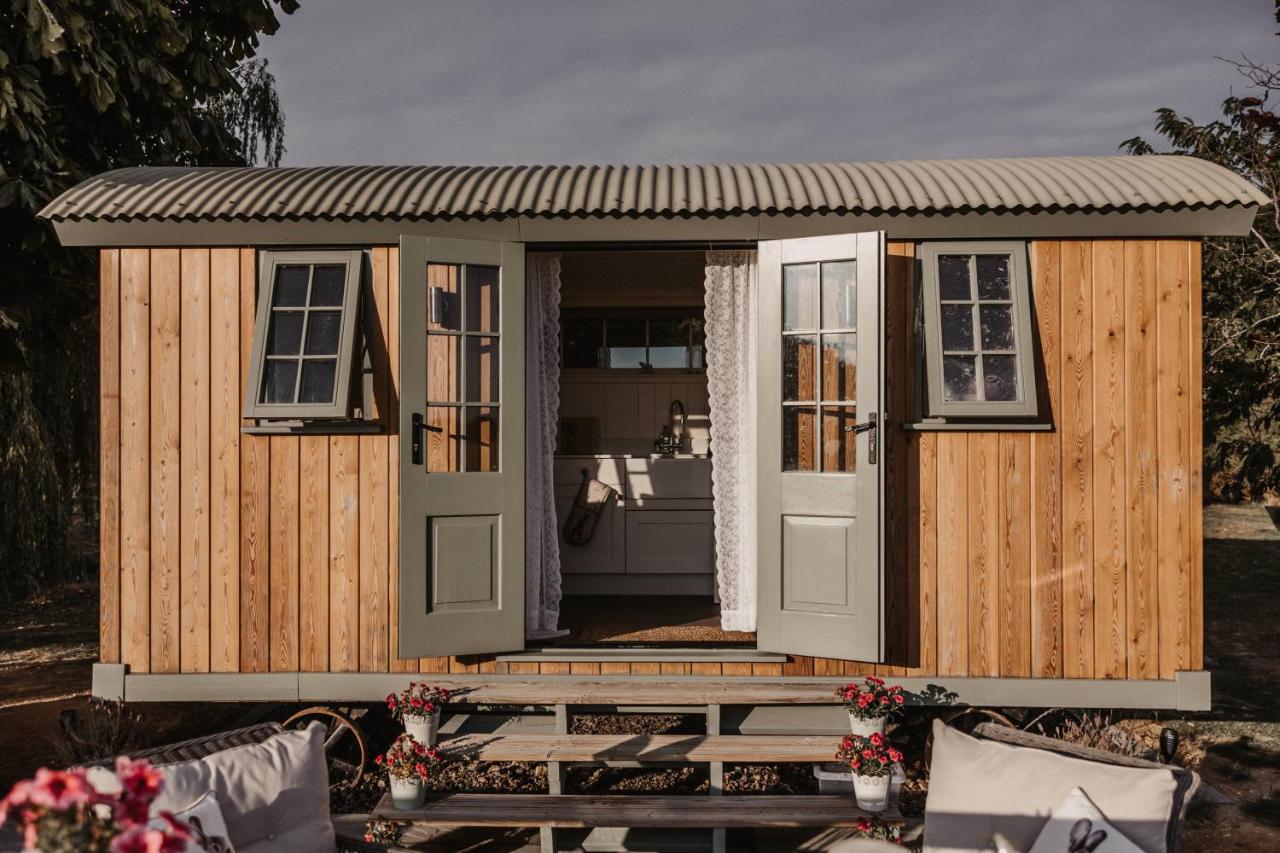 The open doors of the Dragonfly Hut near London