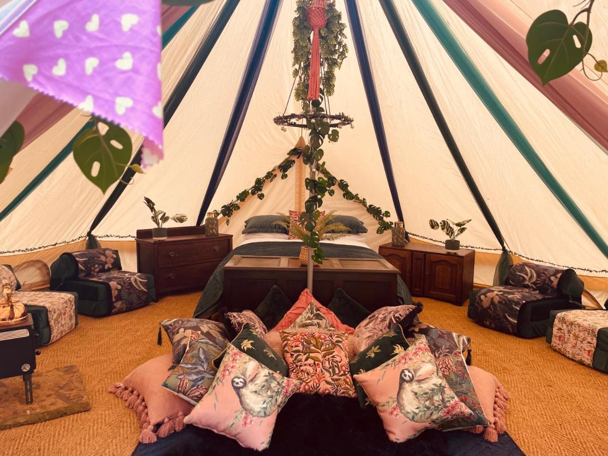 Inside a bell tent at Hollington Park Glamping