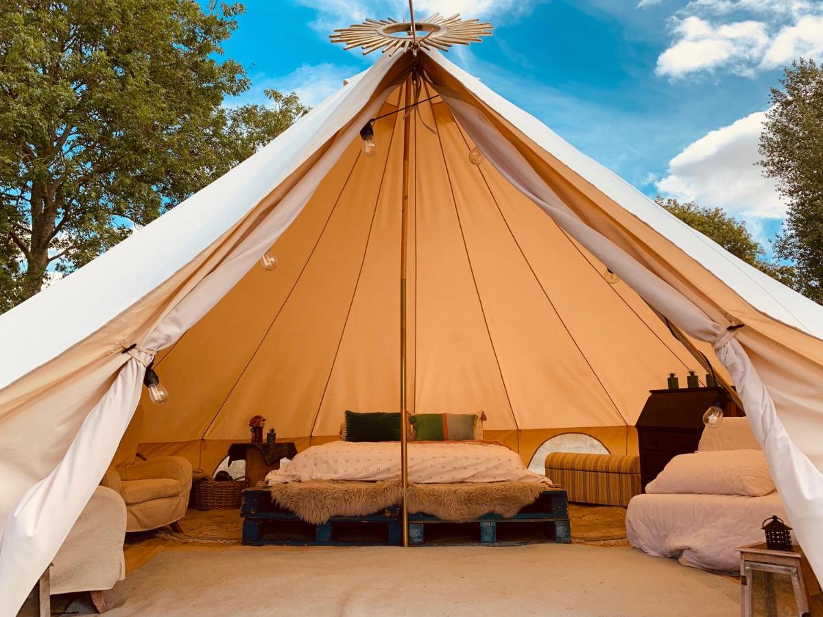 Inside a bell tent at Forest Side Glamping near London